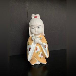 Hakata doll, Girl Holding a bird